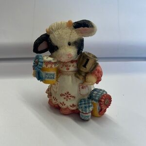 Charming Cow Figurine with Colorful Details